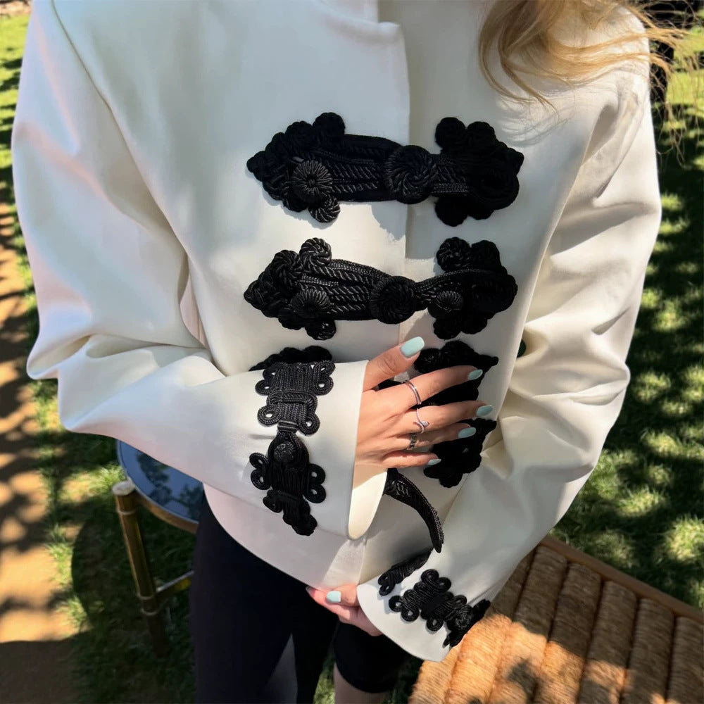 Women’s short blazer in military style with stand-up collar, decorative cord closures and contrasting application Mune Fashion