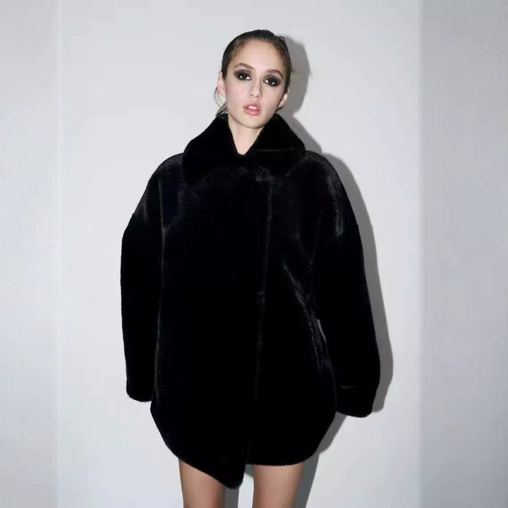 Women's boxy short coat made of silky shiny high-pile artificial fur with a large shawl collar Mune Fashion