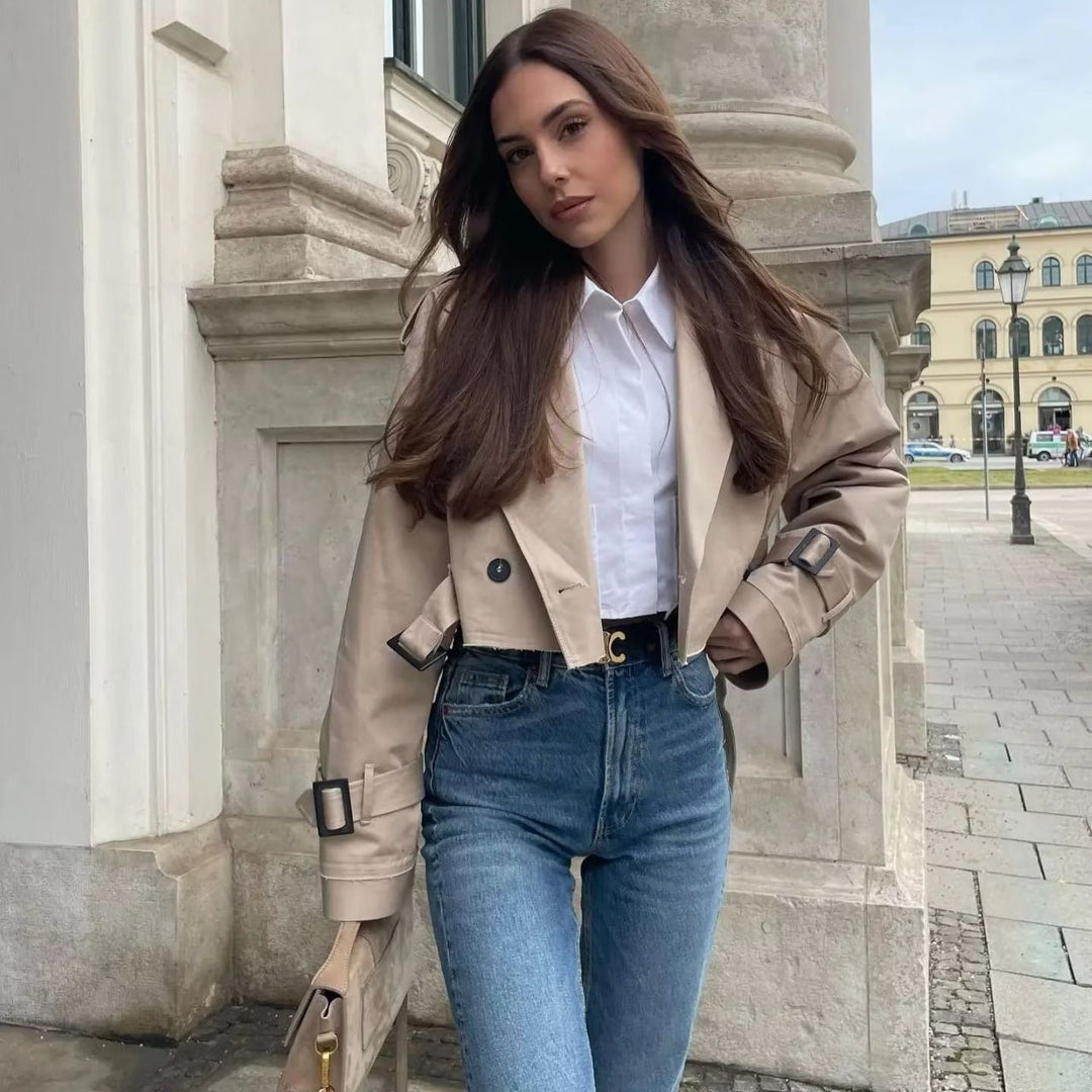 Ladies short trench jacket with epaulettes, waist belt and adjustable cuffs Mune Fashion