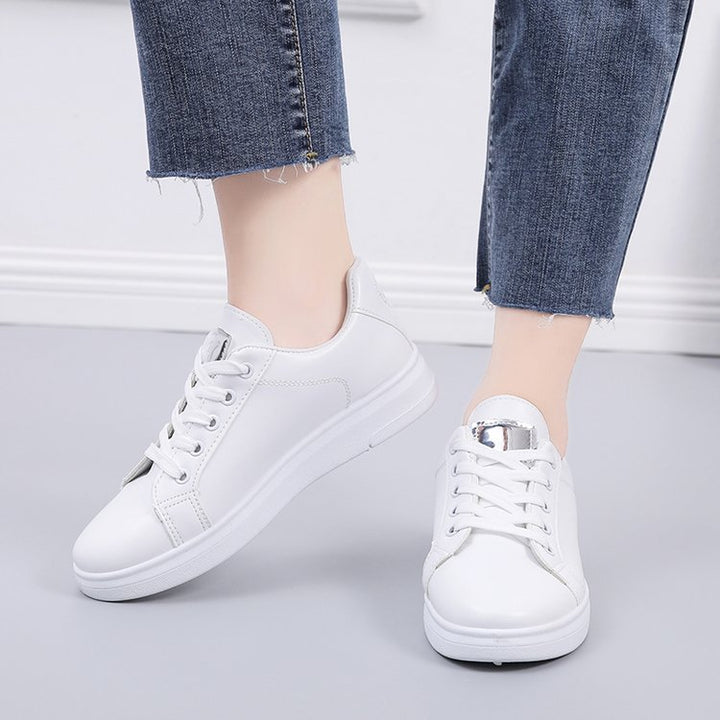 Women's casual urban sneakers with subtle rose embroidery, elevated wedge sole profile and padded comfort insole Mune Fashion