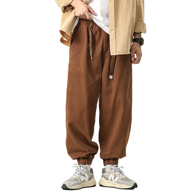 Men's wide relaxed cargo pants in jogger style with elastic tunnel drawstring waistband and cord decoration Drune