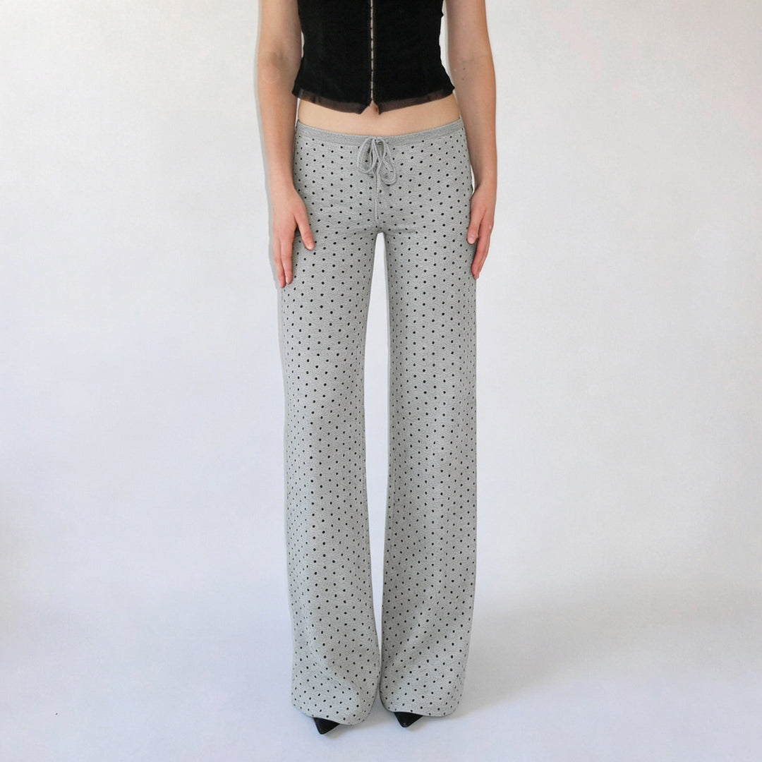 Women's comfortable high-waist lounge pants with wide flare, elastic comfort waistband, drawstring, and subtle dot print Mune Fashion