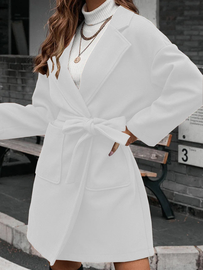 Ladies wrap coat with tie belt, large flap pocket and lapel collar Mune Fashion