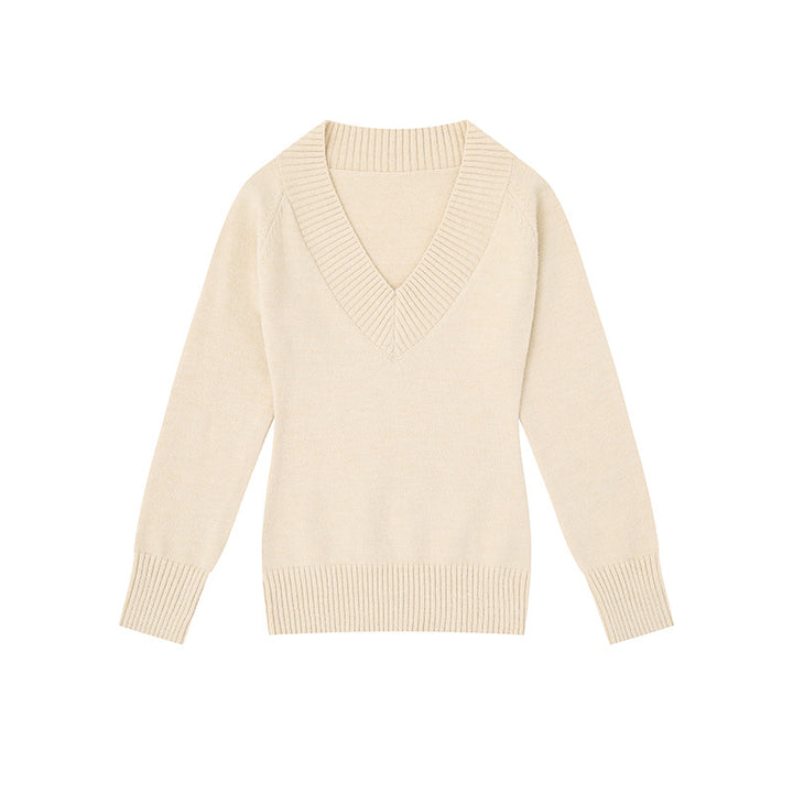 Women's fine knit pullover with deep V-neck, wide ribbed hem, and relaxed fit Mune Fashion