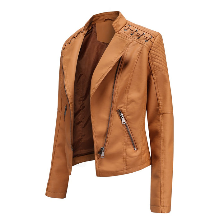Ladies tailored faux leather biker jacket with quilted shoulder section, asymmetrical zipper and decorative eyelets Mune Fashion