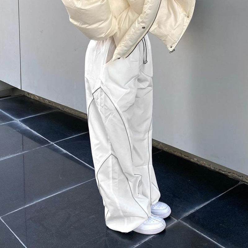 Women wide track pants with drawstring waistband, contrast seam design, and adjustable hem cords Mune Fashion