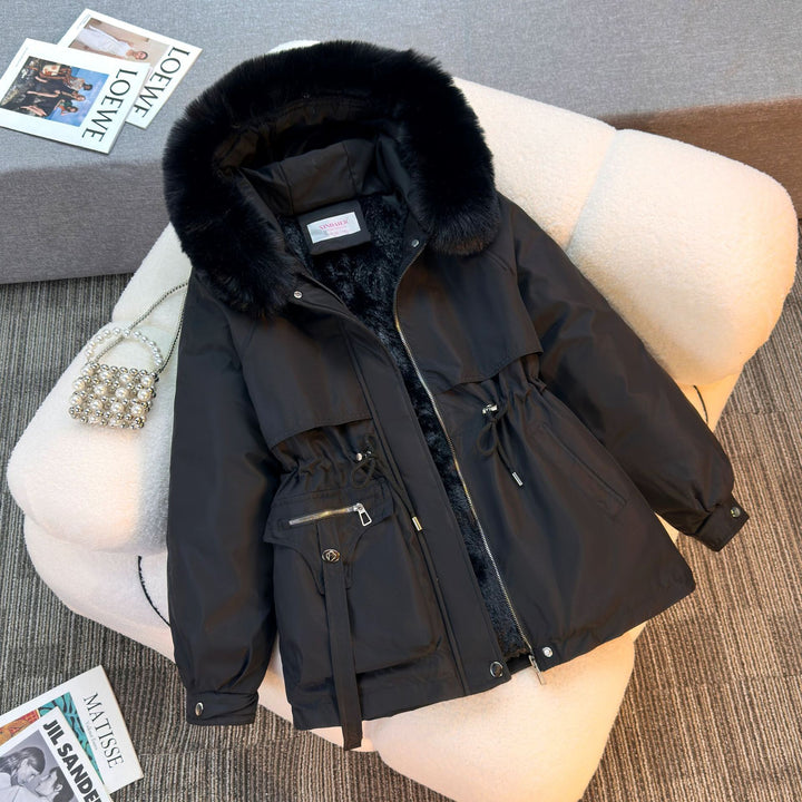 Women's short padded parka with faux fur collar, teddy lining, drawstring waist, and multifunctional pockets Mune Fashion