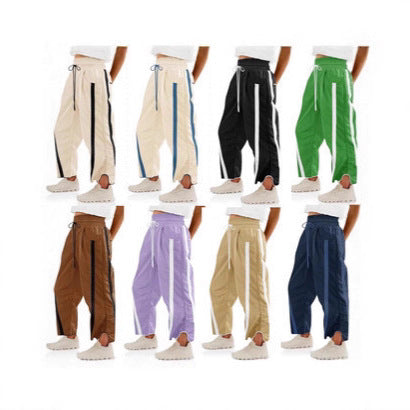 Women's nan relaxed track pants with side contrast stripe, elastic smocked waistband, and side pockets Mune Fashion