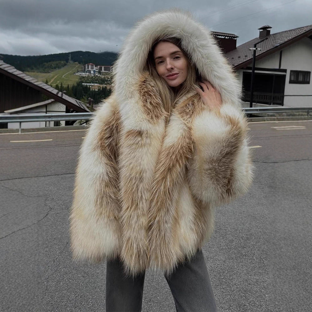 Ladies luxurious short-cut faux fur bomber with voluminous shawl collar and contrasting fur accents Mune Fashion