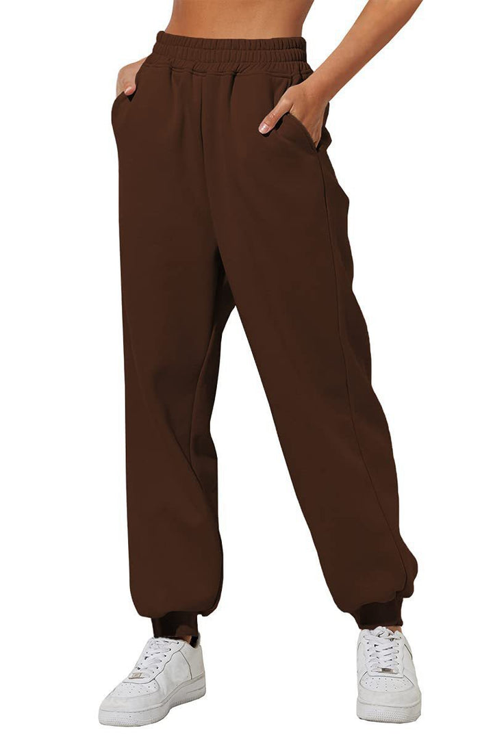 Women's relaxed high-waist jogging pants with double-layer comfort waistband, side pockets, and gathered ankle cuffs Mune Fashion