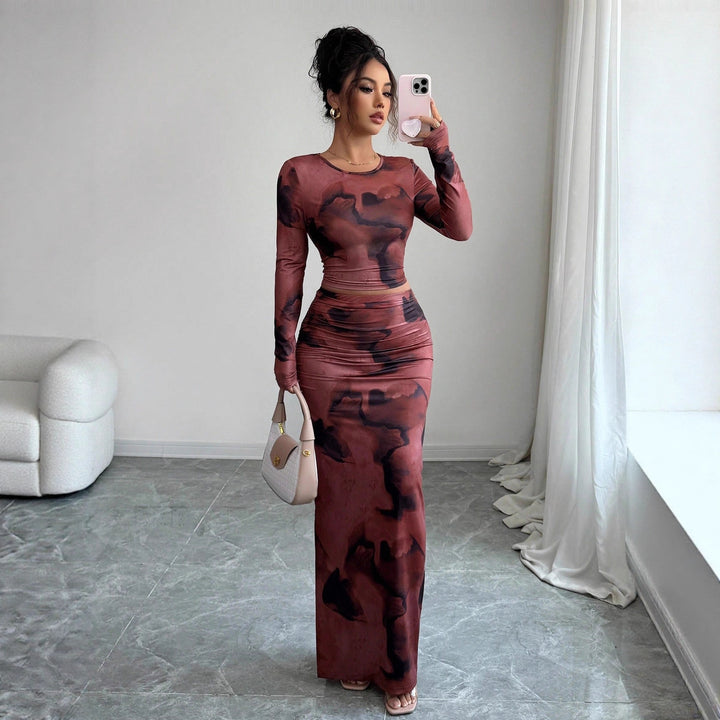 Women's two-piece fitted set made of elastic mesh with long-sleeved crop top, thumbhole, and ruched midi skirt Mune Fashion