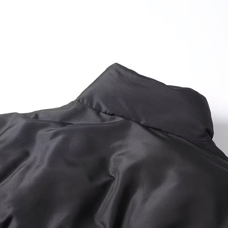 Ladies short padded bomber-style puffer jacket with high stand-up collar and elastic waistband Mune Fashion