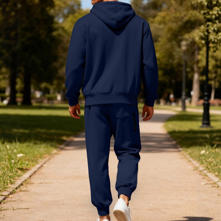 Men's hooded sweatshirt set with full zipper, kangaroo pocket, and tapered joggers with zip pockets Mune Fashion