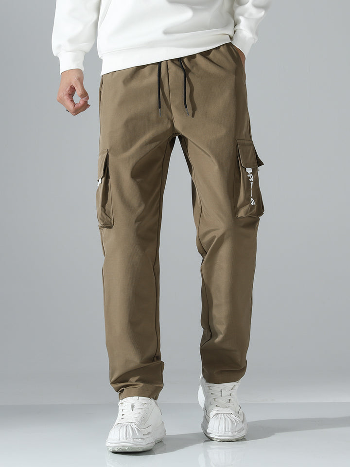 Men's cargo joggers with elastic waistband, side flap & zipper pockets Mune Fashion