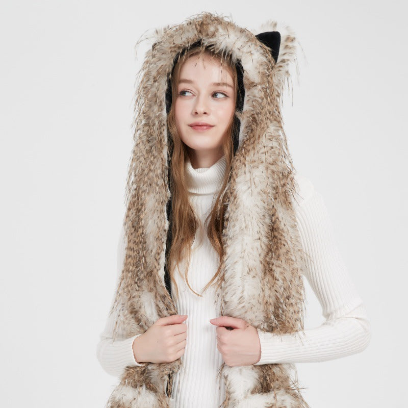 Ladies hooded stole made of luxurious faux fur with long scarf tails and pompom ends Mune Fashion