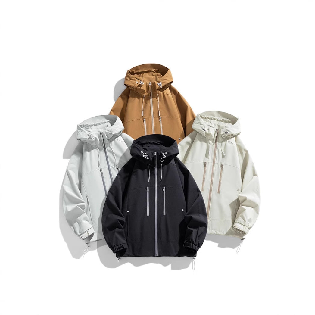 Unisex lightweight water-repellent hoodie jacket with two vertical zip chest pockets and adjustable hem Mune Fashion