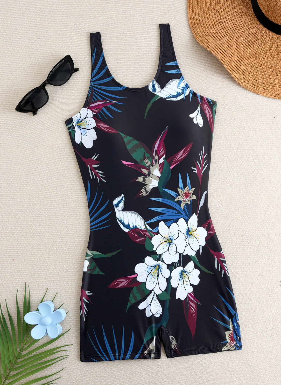 Ladies one-piece swimsuit with floral patterns and sporty cut Mune Fashion