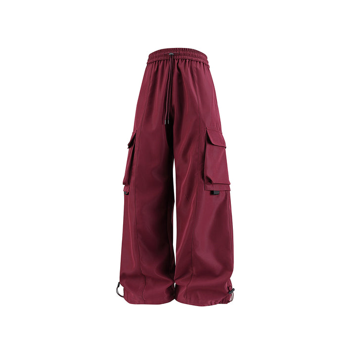 Men's wide utility cargo pants in baggy cut with drawstring waistband, large flap pockets, and adjustable leg hems Drune