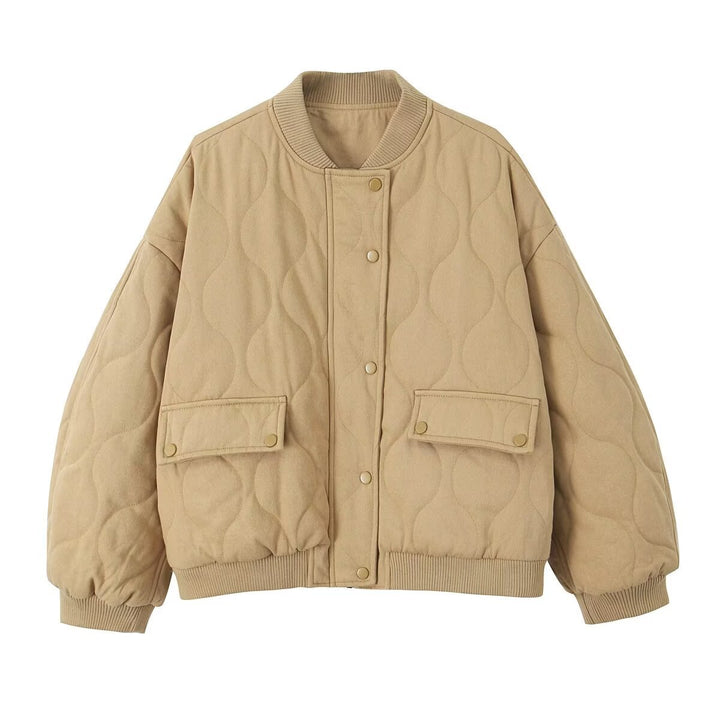 Women's quilted bomber jacket with oversized silhouette, ribbed cuffs, and flap pockets Mune Fashion