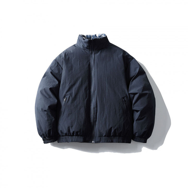Unisex Boxy quilted transitional jacket with standing collar, elastic hem and zipper pockets Mune Fashion