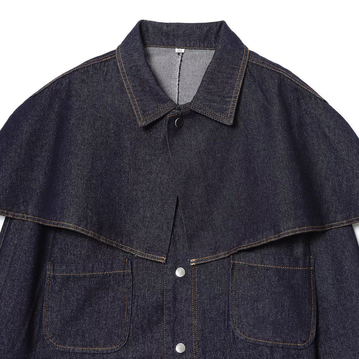Women's cropped denim jacket with cape overlay, snap button closure and patch pockets Mune Fashion
