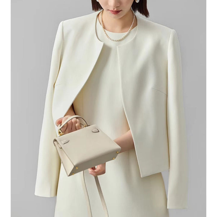 Women's Collarless Short Blazer with Concealed Front Placket and Slightly Tapered Silhouette Mune Fashion