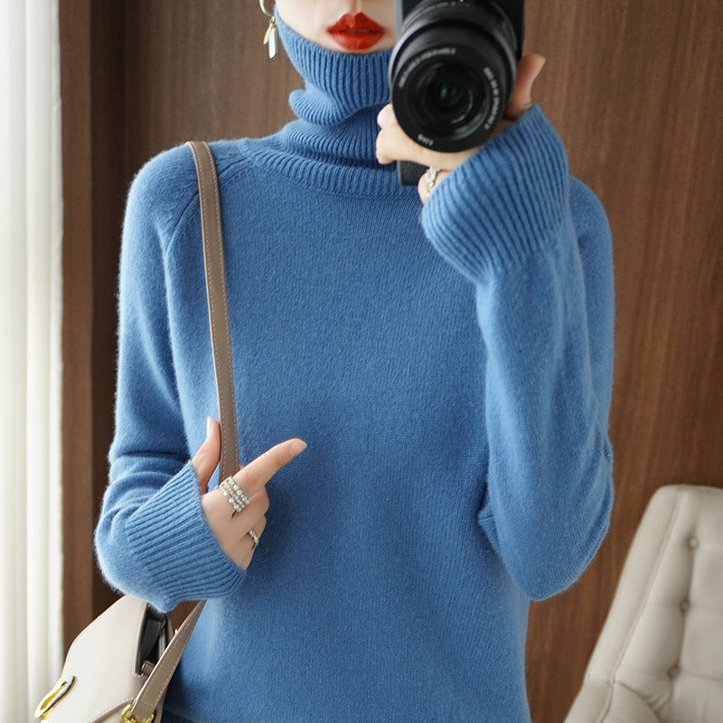 Women's turtleneck sweater made of soft wool blend with extended cuffs Mune Fashion