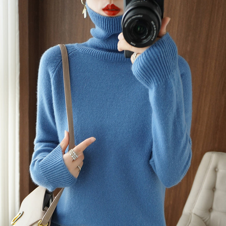Women's turtleneck sweater made of soft wool blend with extended cuffs Mune Fashion