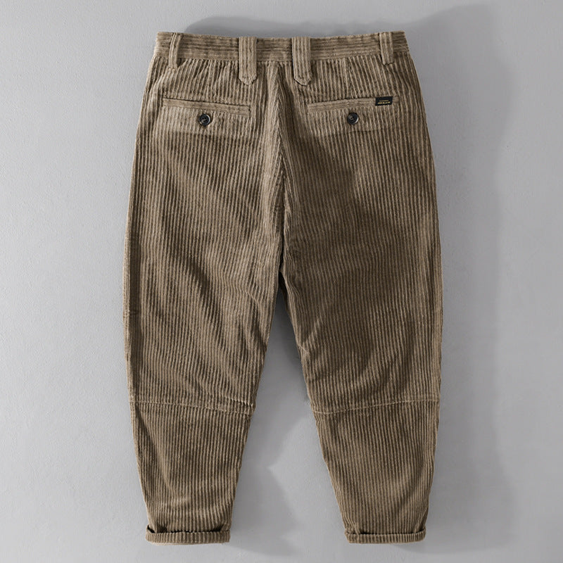 Men's corduroy pants with a tapered cut, high waistband, checked inner band, and rolled hem Mune Fashion