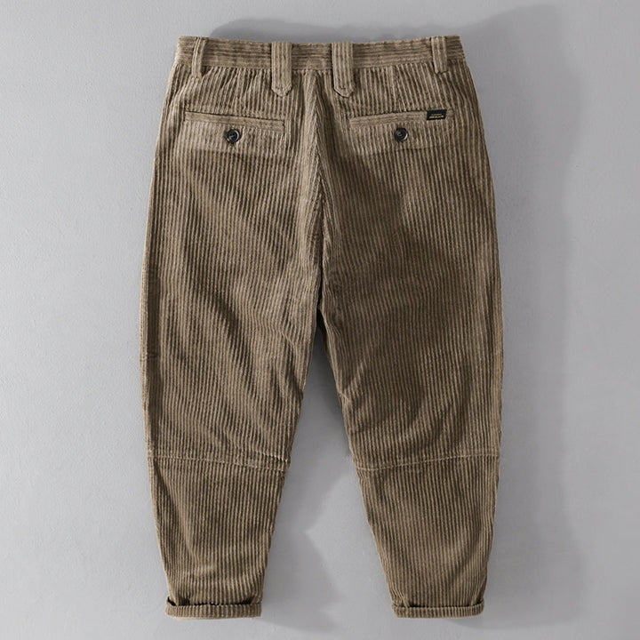Men's corduroy pants with a tapered cut, high waistband, checked inner band, and rolled hem Mune Fashion