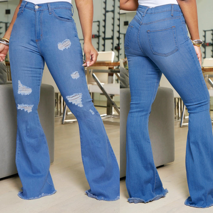 Ladies' waist-fitting flared jeans with ripped inserts and raw hem Mune Fashion
