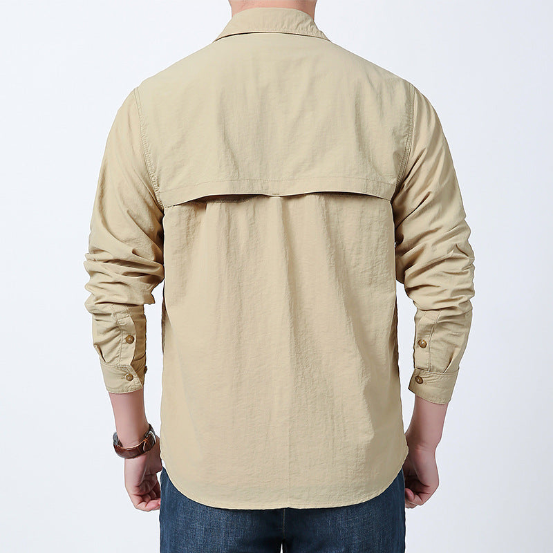 Men's long-sleeved field shirt made of lightweight ripstop with multifunctional chest pockets and concealed zip.