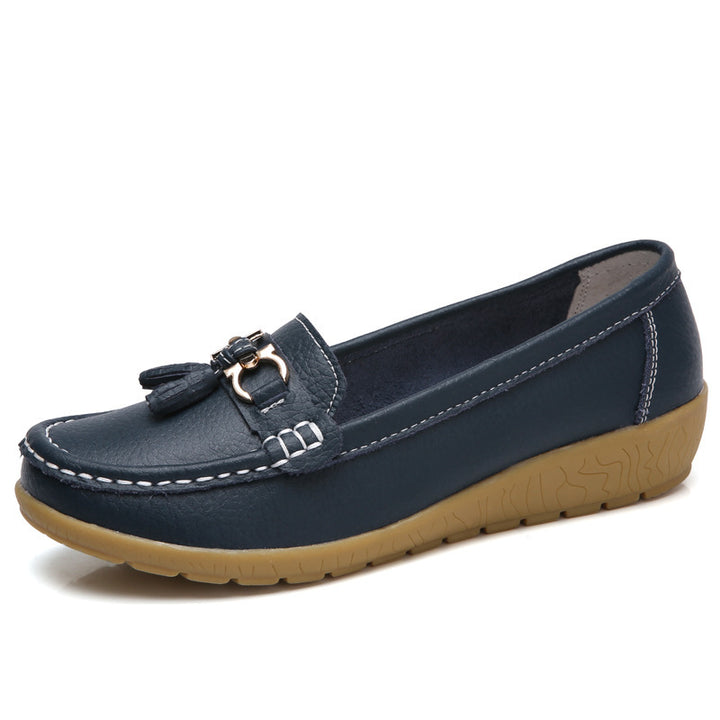Women's classic tassel moccasin made of textured synthetic leather with padded comfort insole and flexible wedge sole Mune Fashion