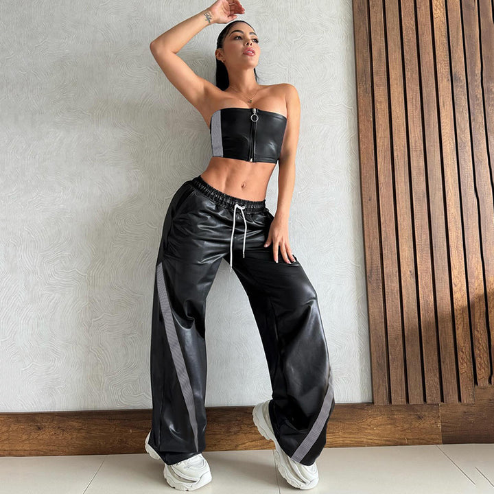 Ladies wide faux leather track pants with elastic waistband, drawstring and side stripes Mune Fashion