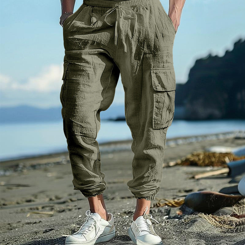 Men's casual cargo pants in jogger style with crinkle linen look, drawstring waistband, and multiple pockets Mune Fashion