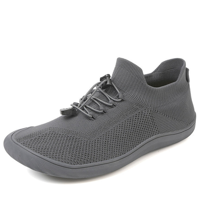 Unisex slim-knit slip-on trainer with toggle lacing and ultra-flexible minimal sole Mune Fashion