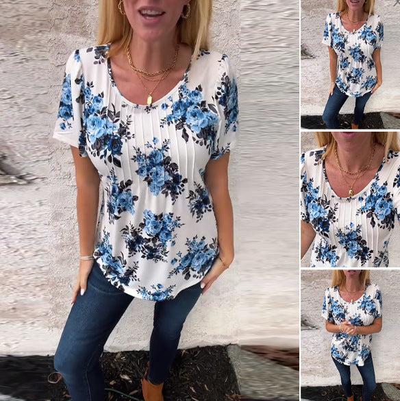 Women's short-sleeve blouse with box pleats, round neckline and floral all-over print Mune Fashion