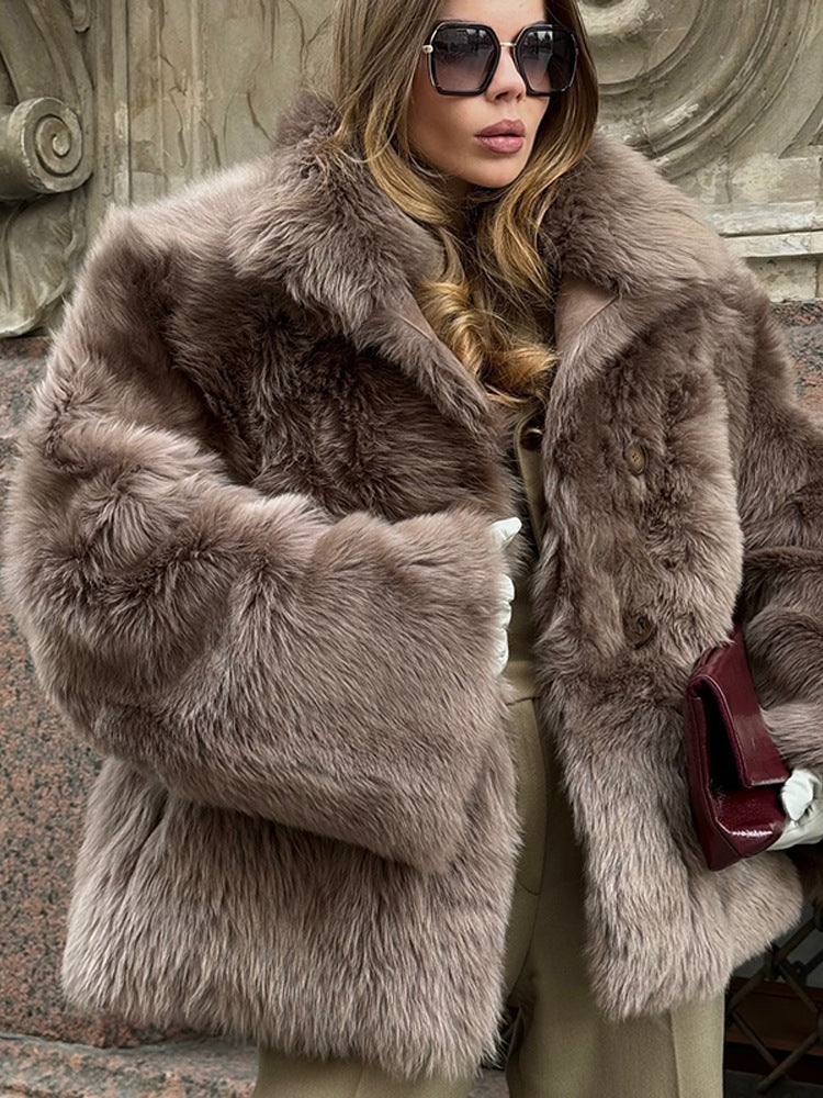 Women short coat made of luxurious faux fur with voluminous shawl collar and boxy silhouette Mune Fashion