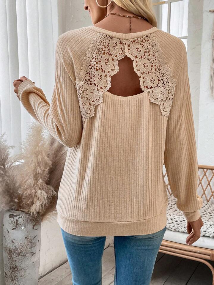 Women's ribbed long sleeve shirt with floral lace appliqué and distinctive back cut-out Mune Fashion
