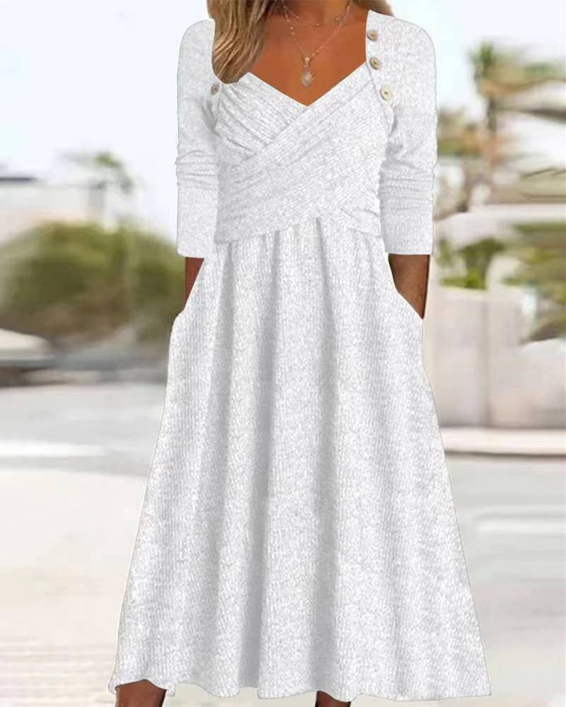 Women's knitted maxi dress with wrap top V-neck, side pockets and decorative button placket Mune Fashion