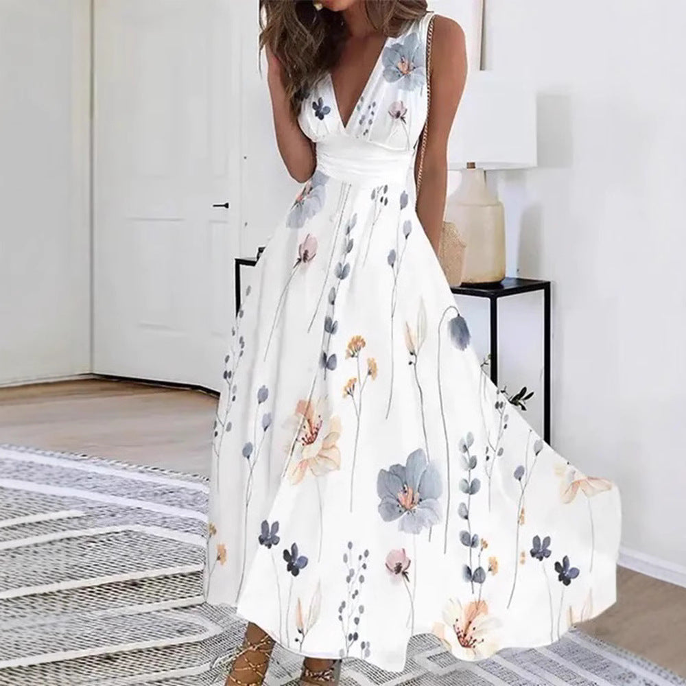 Women's flared midi dress with deep V-neck, empire waist and delicate floral print Mune Fashion