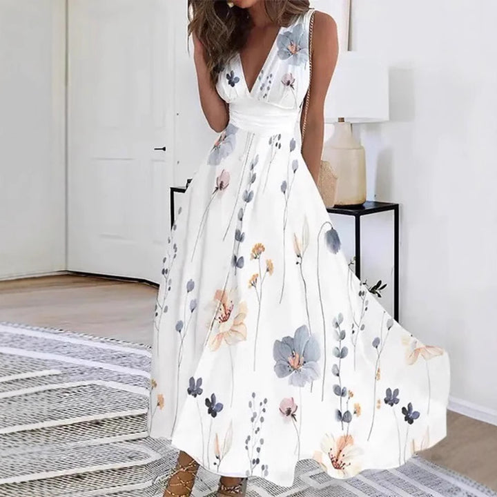Women's flared midi dress with deep V-neck, empire waist and delicate floral print Mune Fashion
