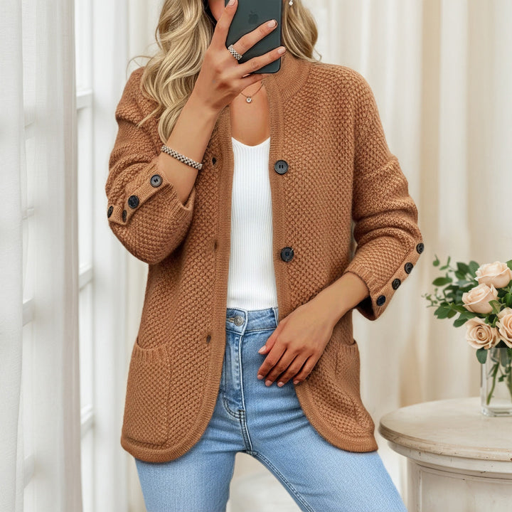 Women's structured oversized cardigan with decorative sleeve button placket and patch pocket Mune Fashion