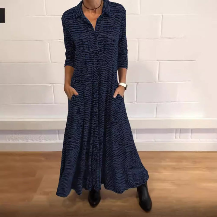 Ladies' flowing maxi dress with shirt collar, half-length sleeves, and side pockets Mune Fashion