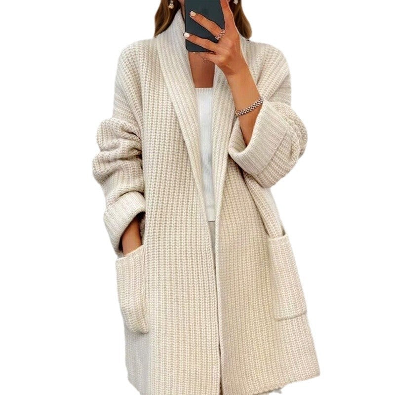 Women's longer oversized knitted coat with shawl collar and patch pockets Mune Fashion