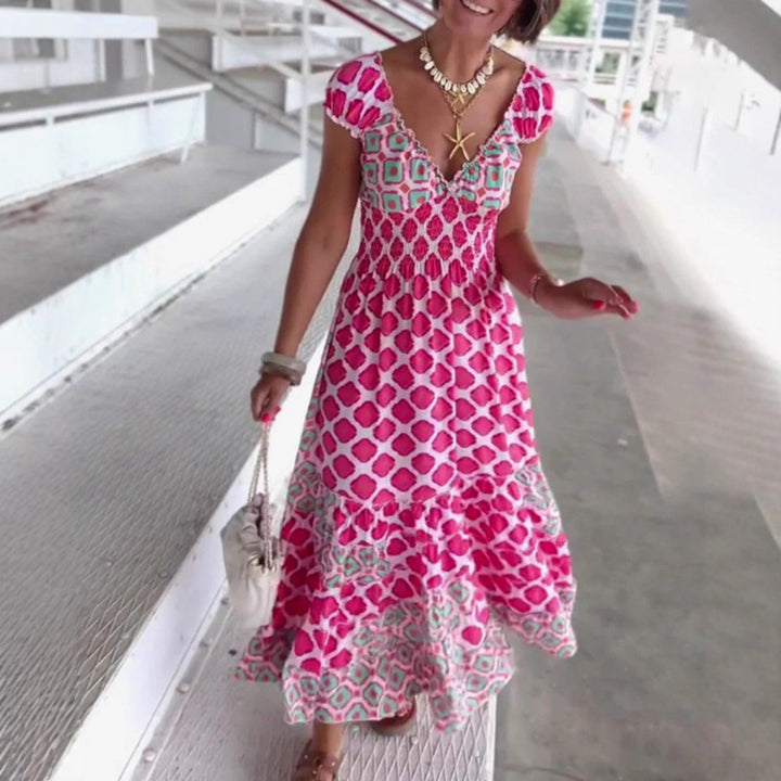 Women’s summer tiered dress with smocked top, V-neckline and puff sleeves Mune Fashion