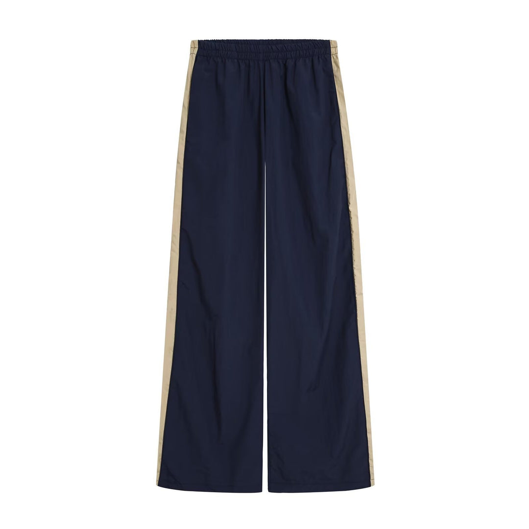 Women Two-Piece Sporty Track Set with Windbreaker Jacket and Wide Track Pants Cut Mune Fashion