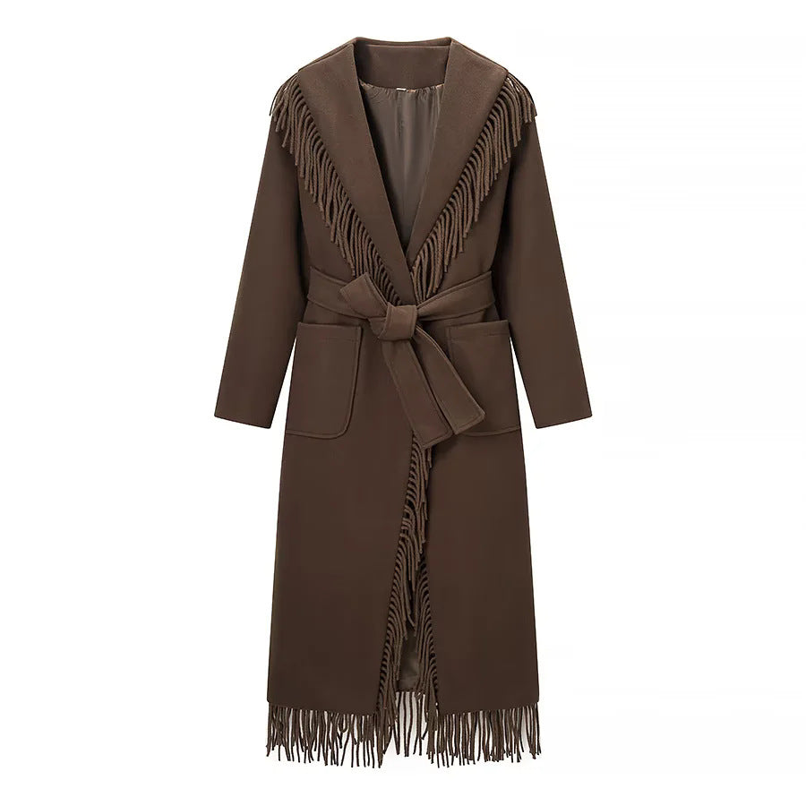 Ladies long fringed coat with voluminous shawl collar, waist belt and patch pockets Mune Fashion