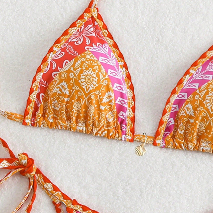 Women's triangle bikini with playful cut and exotic pattern Mune Fashion