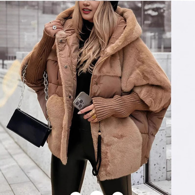 Women's oversized quilted winter jacket with faux fur panels, hood and integrated ribbed sleeve details Mune Fashion